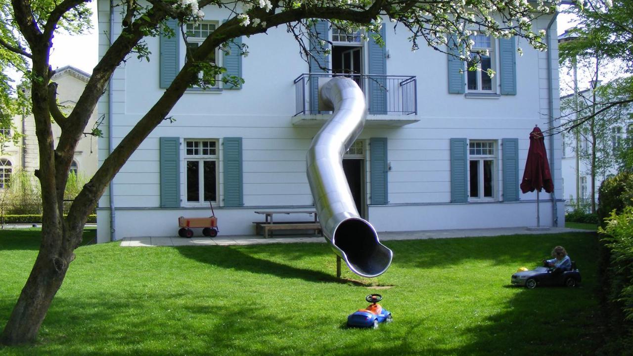 Grand Hotel Heiligendamm - The Leading Hotels Of The World Exterior photo A slide in a private garden